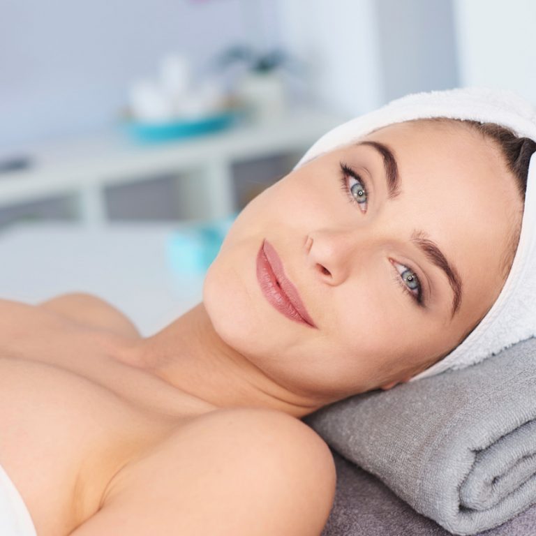 Beautiful woman relaxing in spa